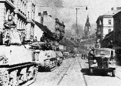 Soviet M4A2 tanks on Krenova street in Brno.gif