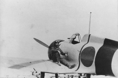 Hagiri sitting on the wing of his A5M4.jpg