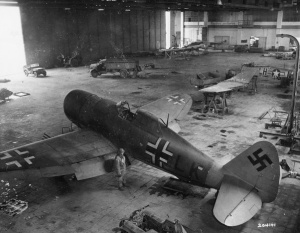 Captured German P-47 in a hangar, designated T9+LK